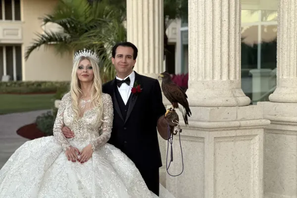 Happy couple with hawk