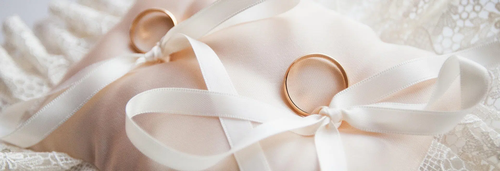 Let Hawkeye's birds of prey play a part in your wedding! weddings rings on lace p;illow